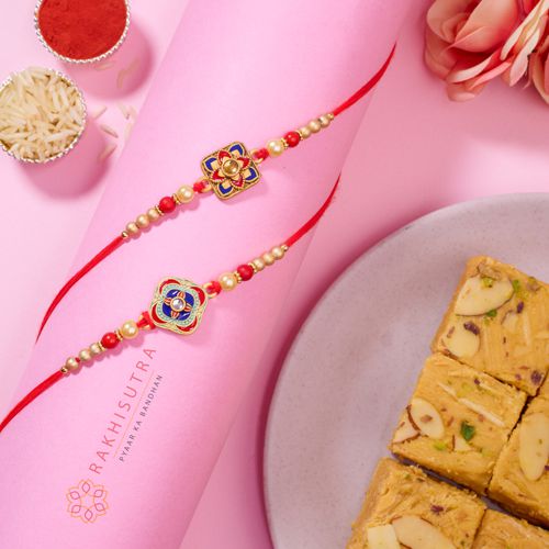 Elegant Kundan Rakhi Pair with Sweet Soan Papdi